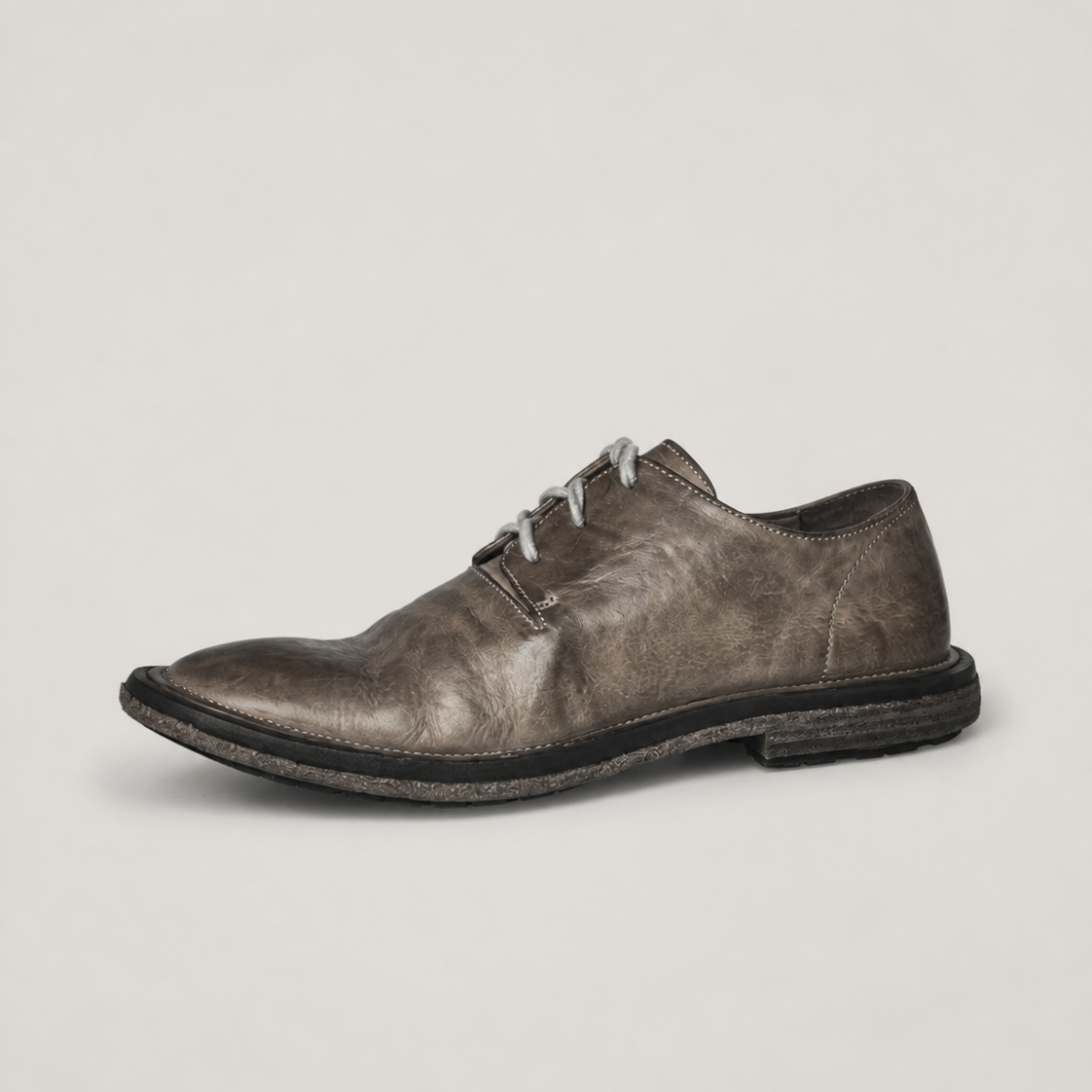 Gray-brown washed horsehide Derby shoe shown from the side