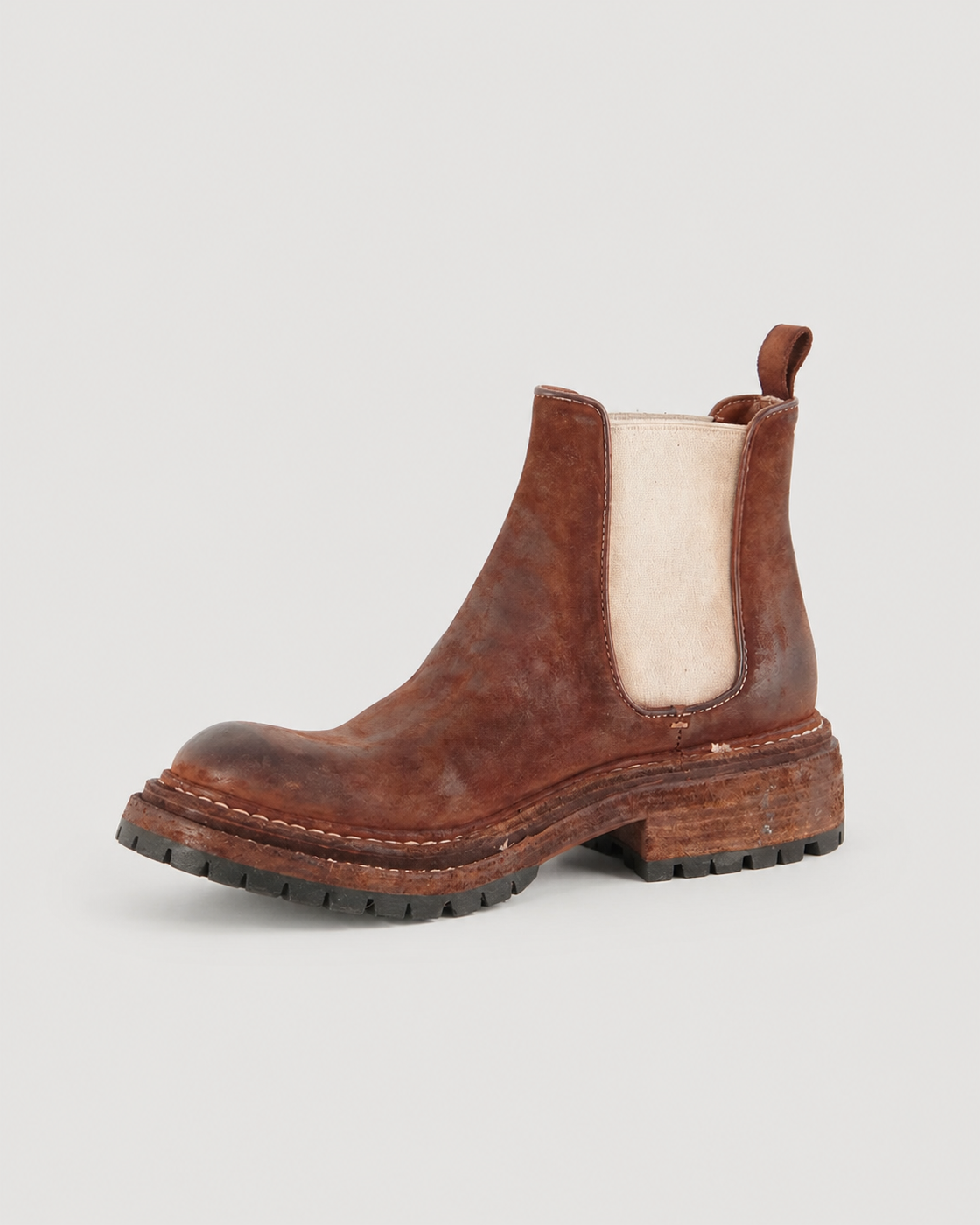 Textured Shell Cordovan Chelsea boot on a light gray background