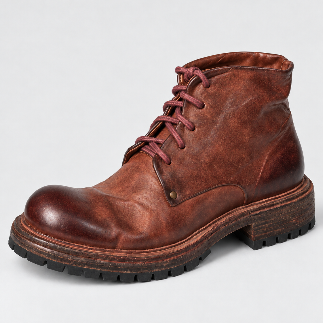 Dark brown washed horsehide lace-up boot showing tonal variation