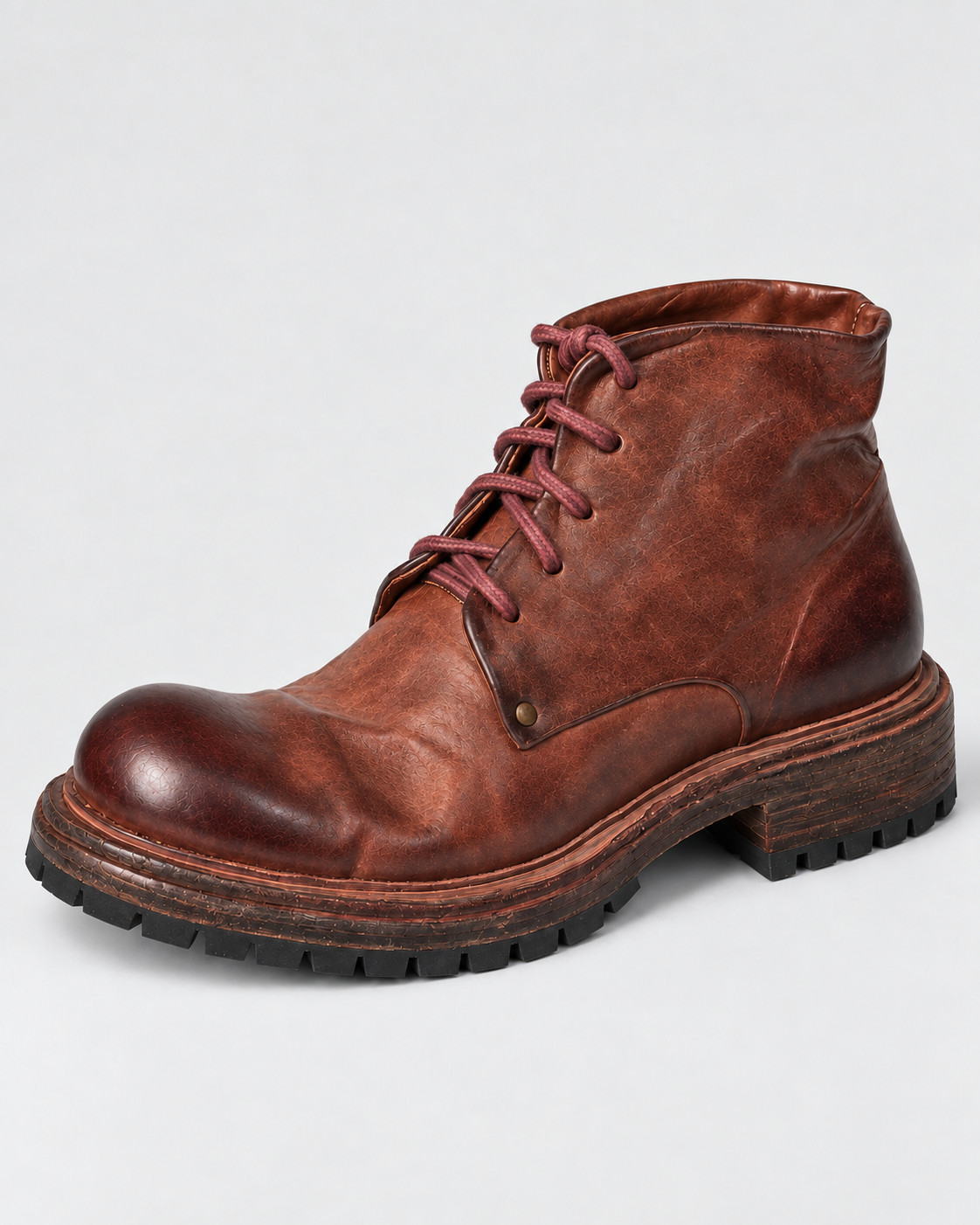 Dark brown washed horsehide lace-up boot showing tonal variation