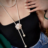Long imitation pearl necklace with multiple layers JA043